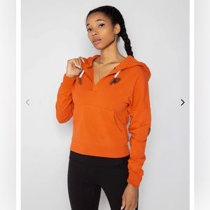 Wanakome burnt orange hooded sweatshirt size medium, new condition!